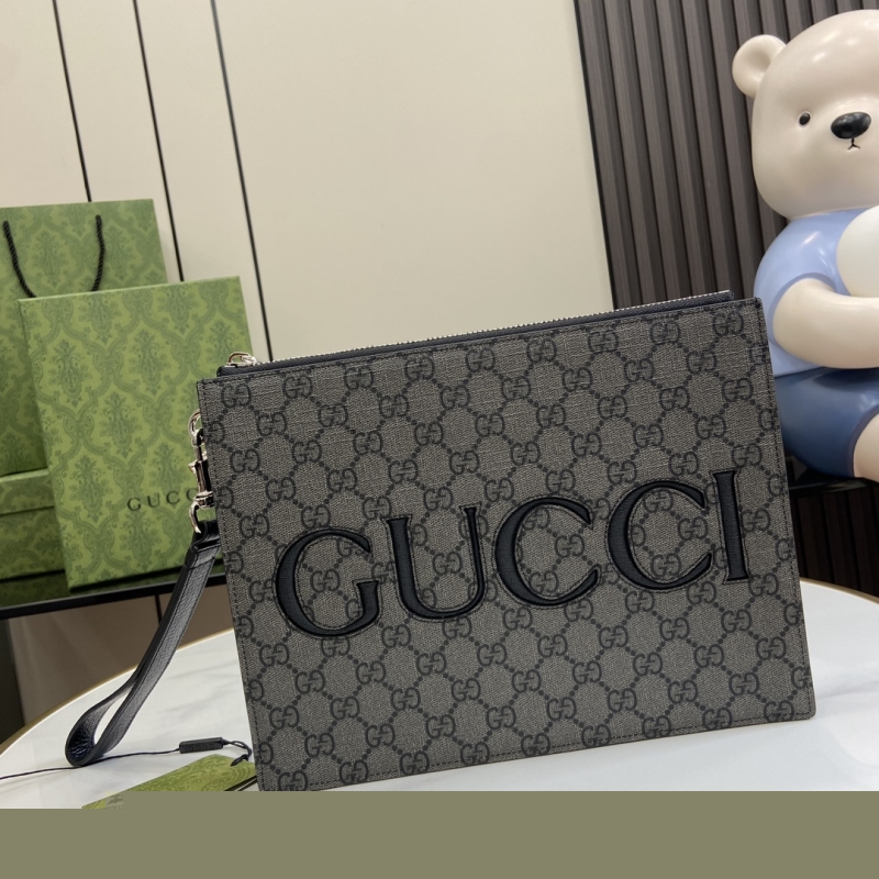 G*u*i clutch bags